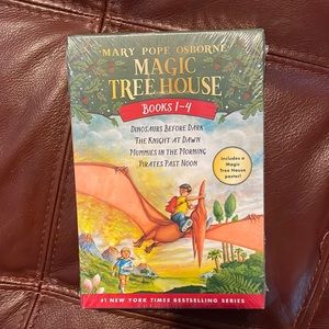 Magic Tree House books 1-4 by Mary Pope Osborne